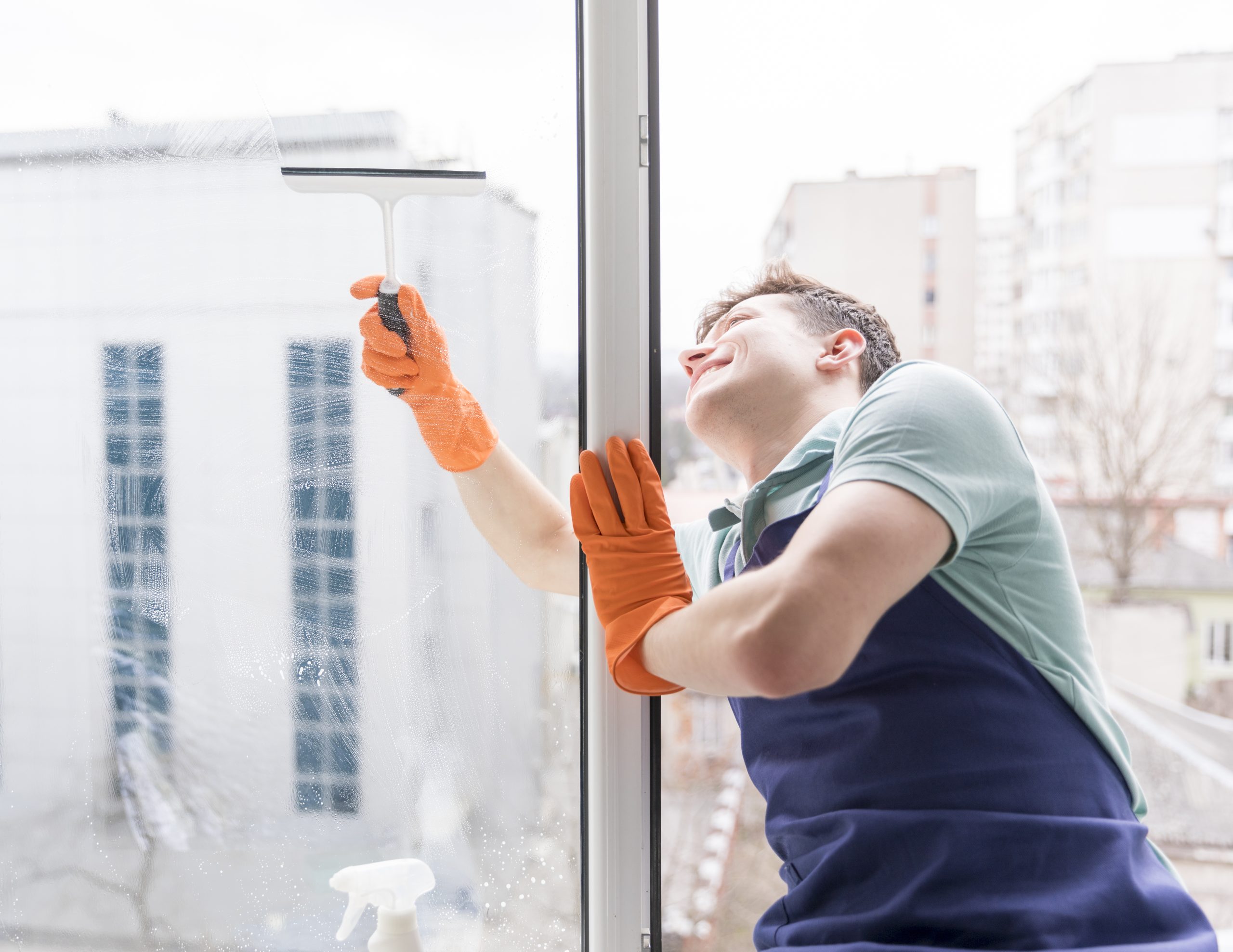 man-cleaning-windows